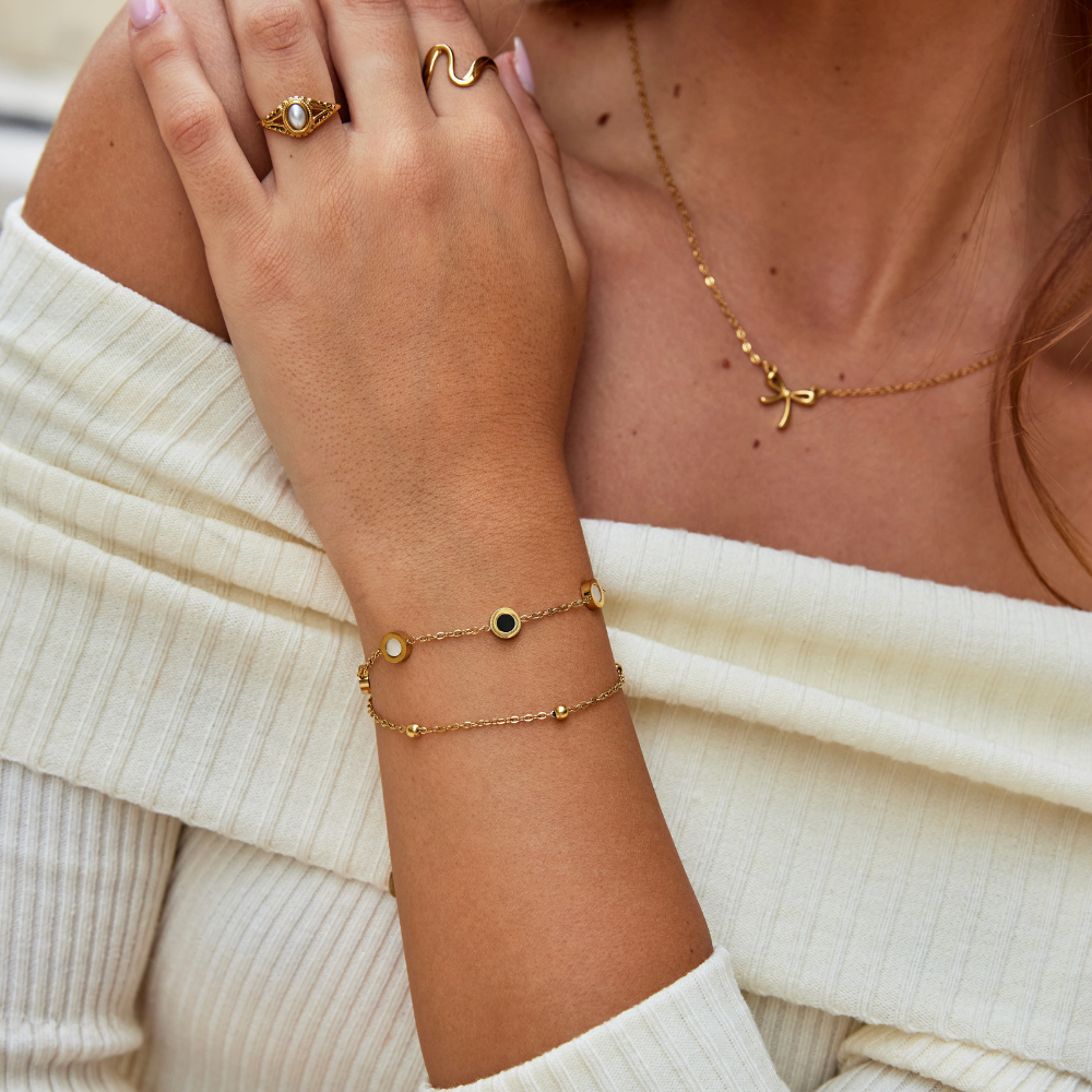 Onyx- og hvid stenarmbånd